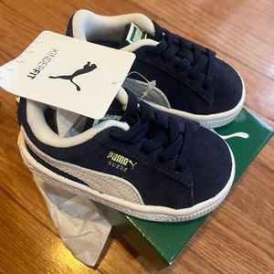 Brand new. Puma kids size 4c